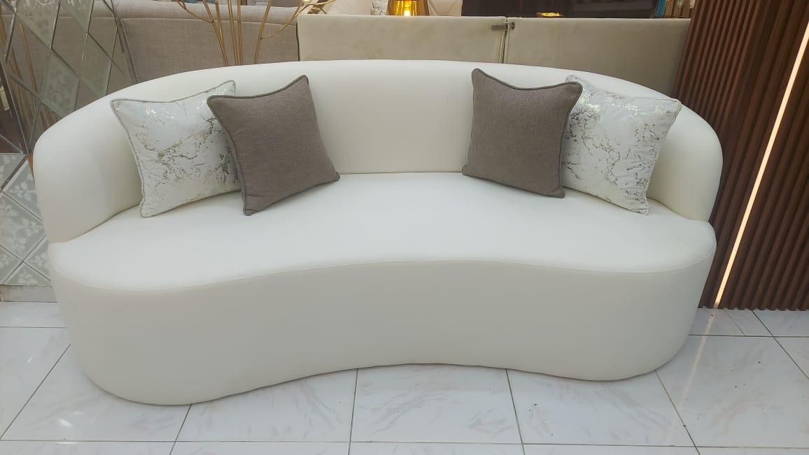 Modern Cream Curved Sofa with Accent Pillows