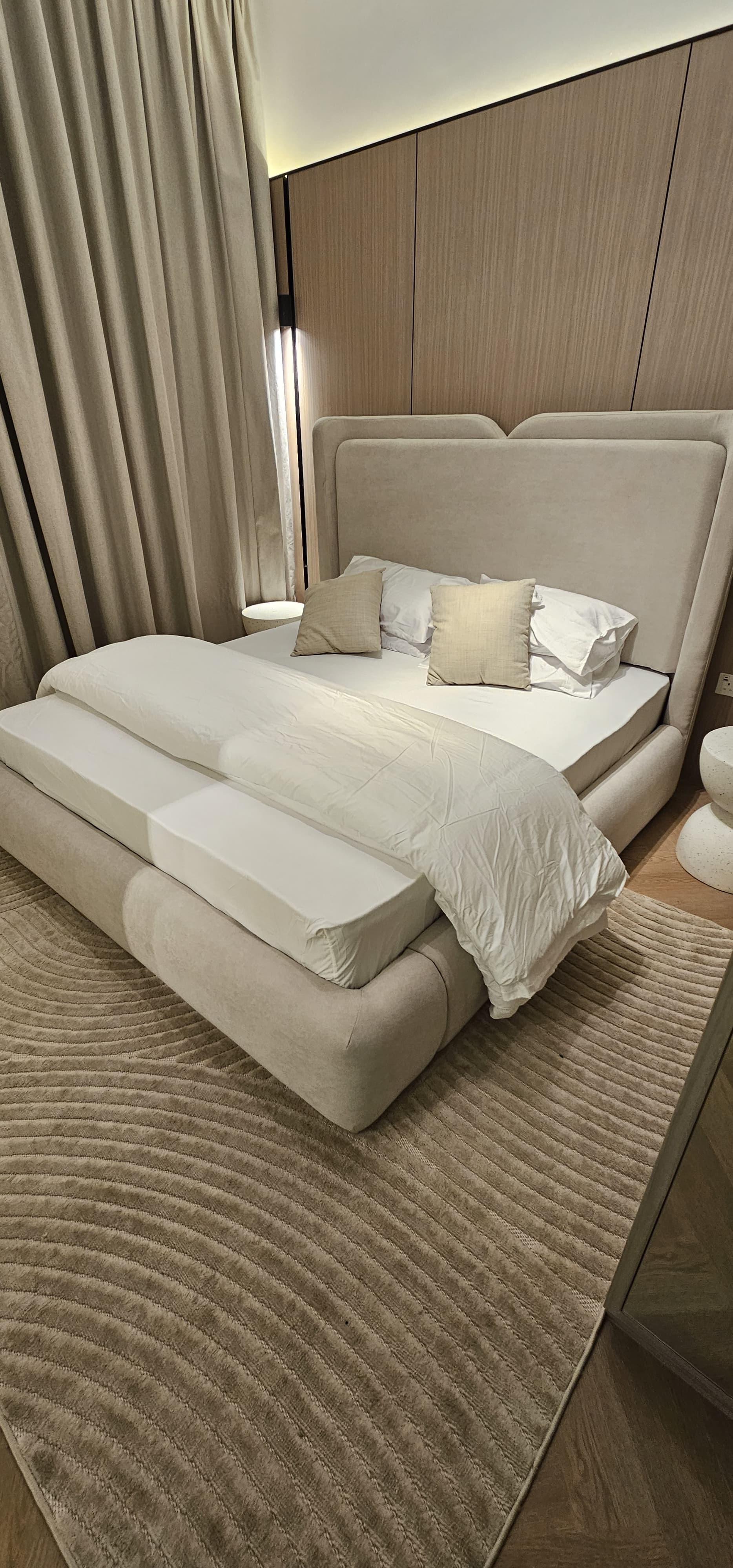 Modern Master Bedroom with Warm Pendant Lighting