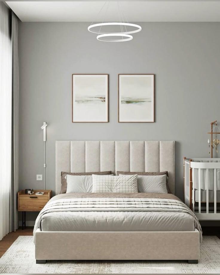 Modern Upholstered Bed and White Baby Cot Setup