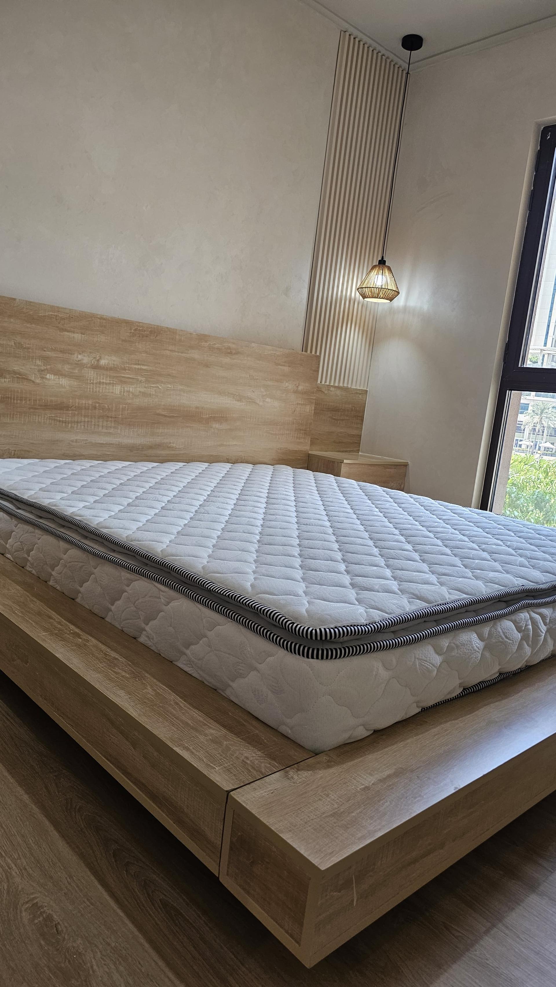 Custom Wooden Platform Bed and Mattress Setup